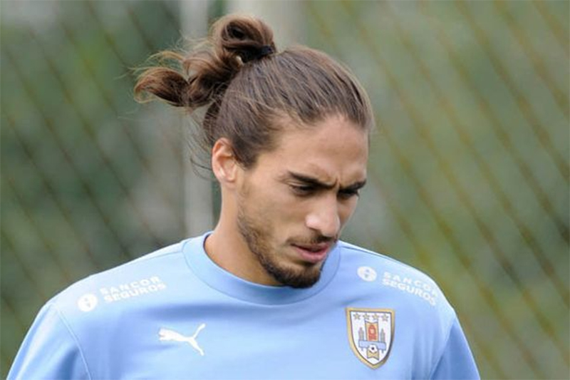Martin Caceres với mái tóc đuôi ngựa đặc trưng